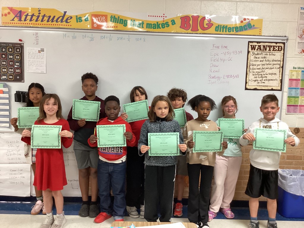 Students with their certificates. 