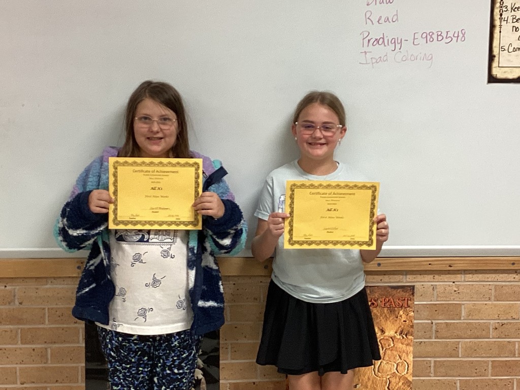 Students with their certificates. 