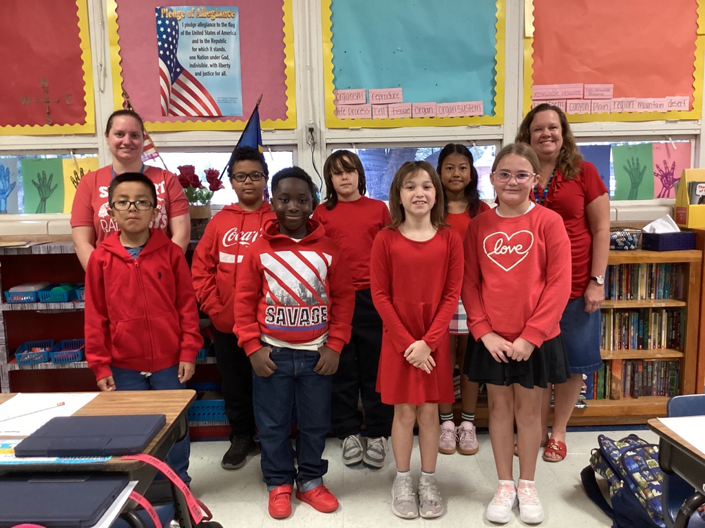 Students wearing red.