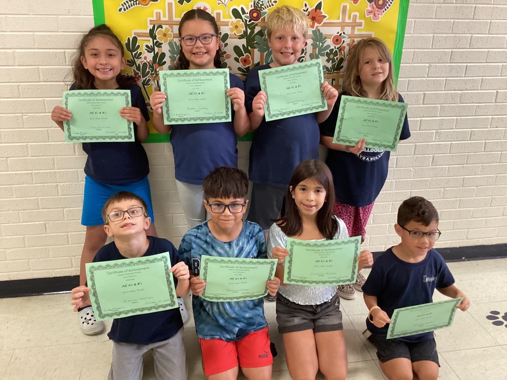 Students with their certificates. 