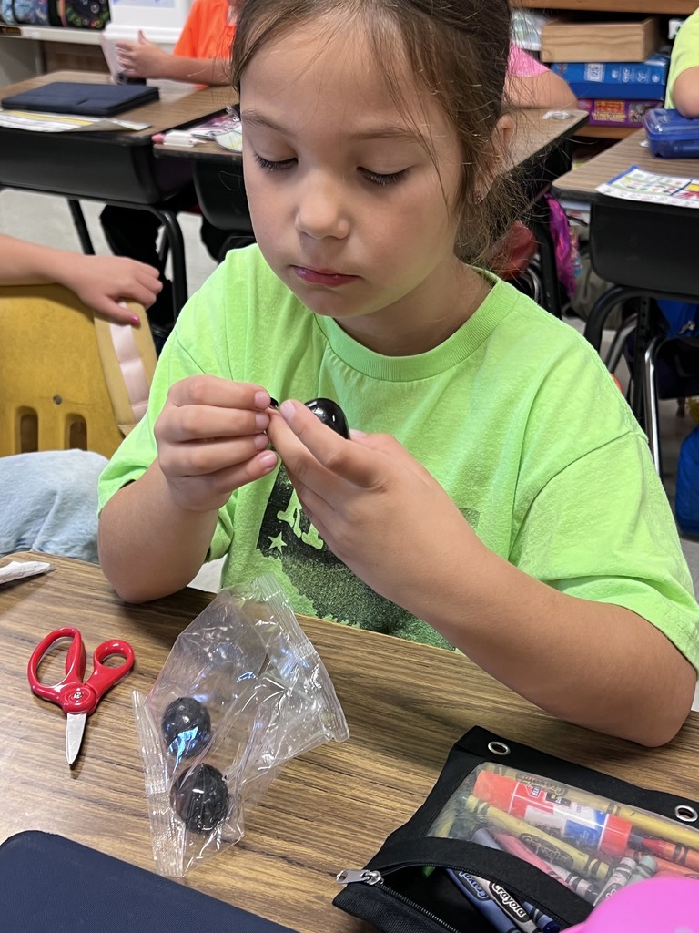Students eating fruit.