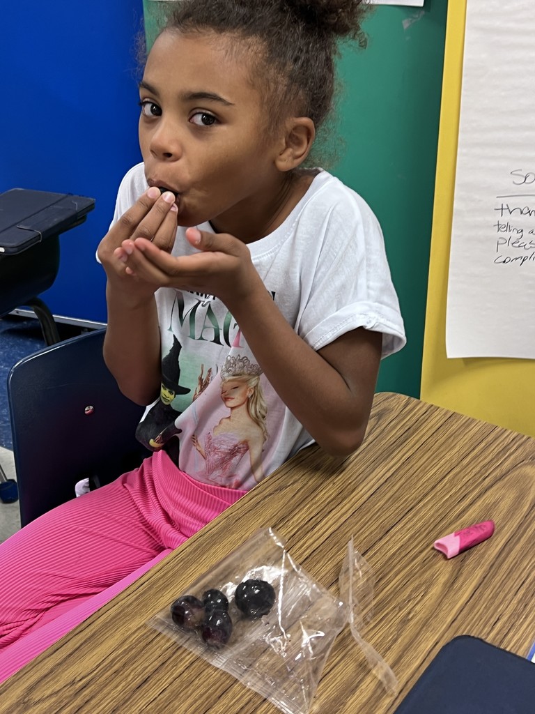 Students eating fruit.
