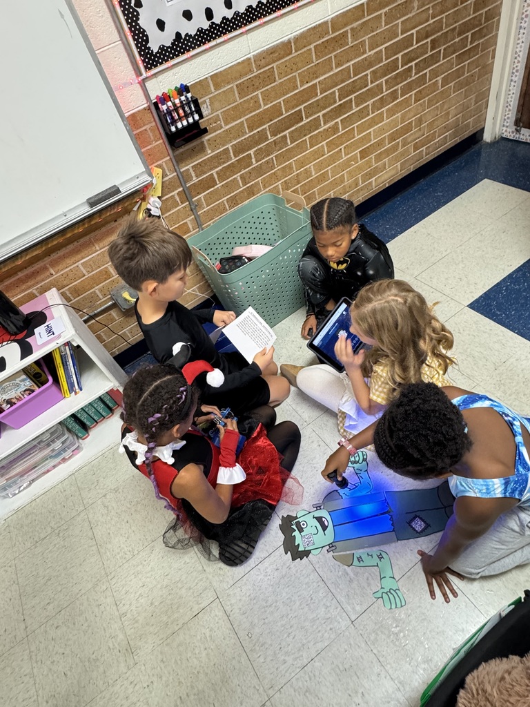 students doing halloween activity