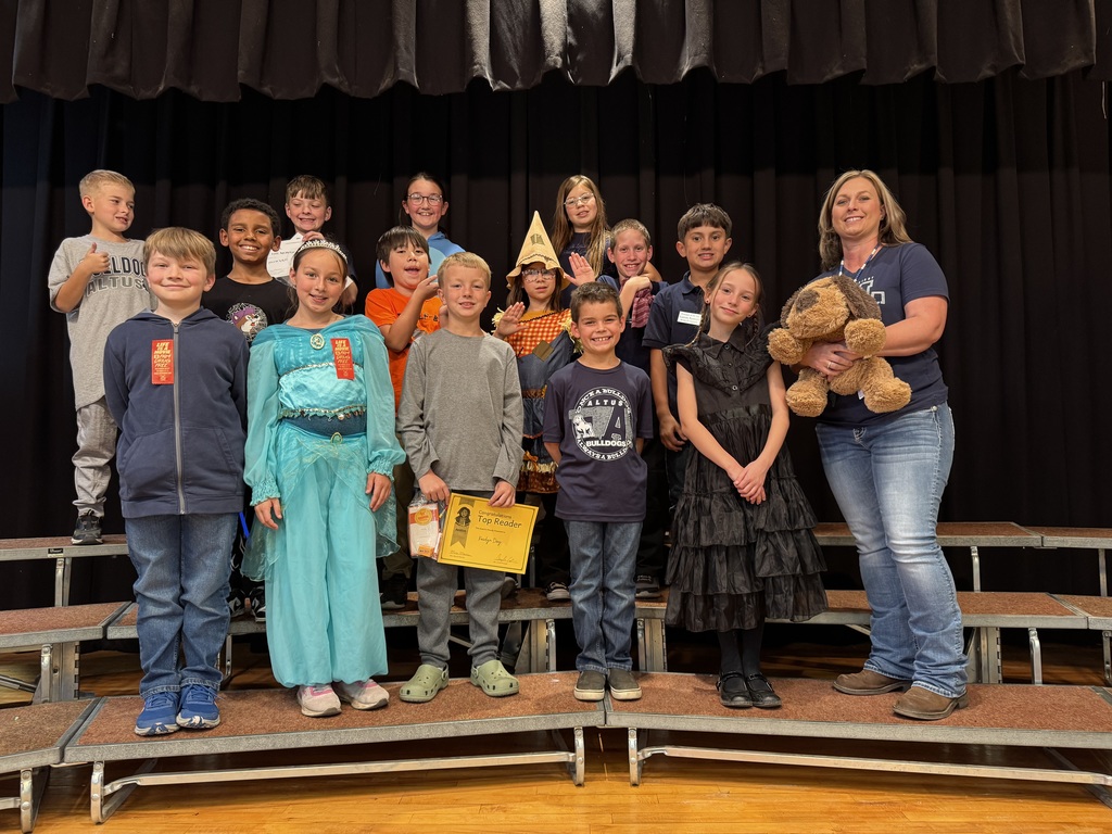 Students with their Amira dog and teacher.