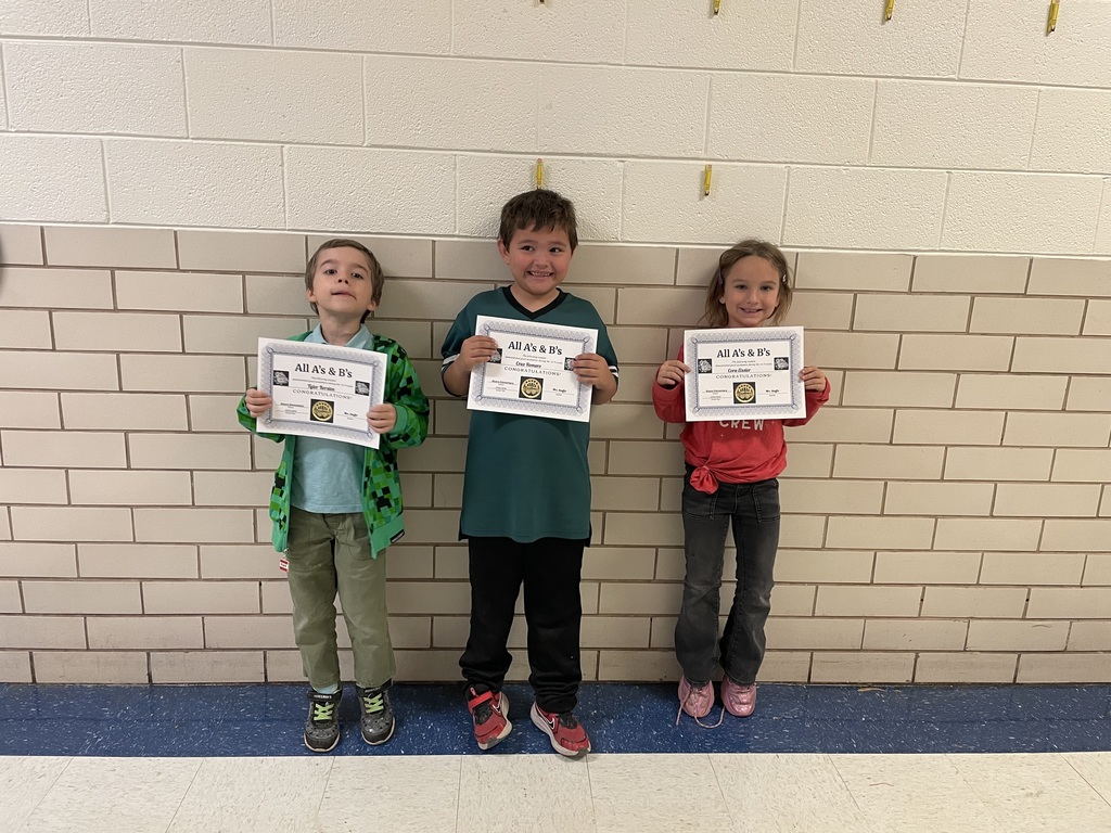 Students with their certificates.
