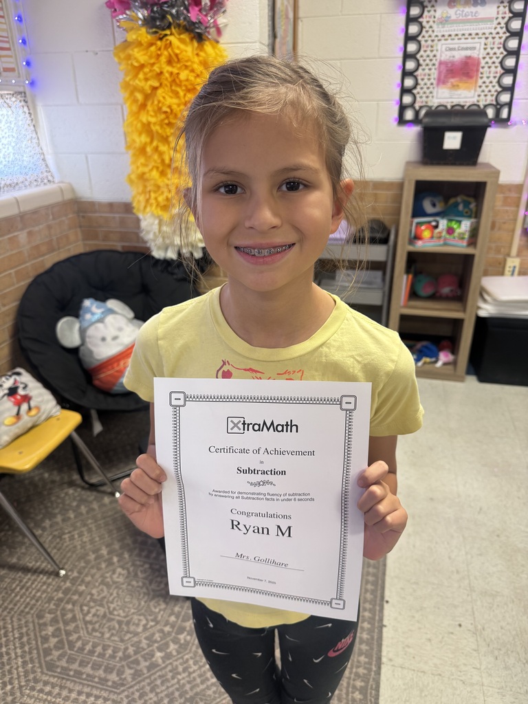 Student with her certificate.