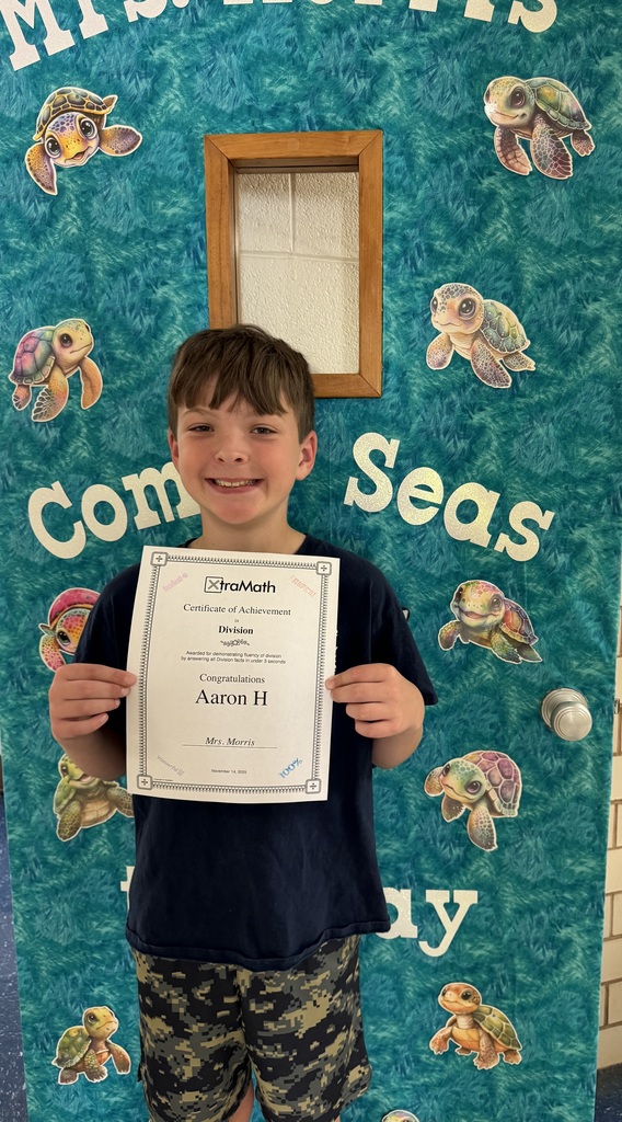 Aaron with his certificate.