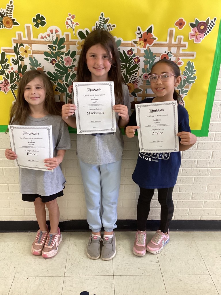 student wtih their certificates