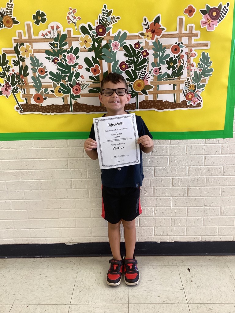 student wtih their certificates