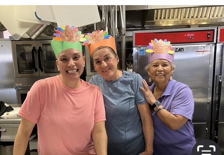 cafeteria wearing turkey hats