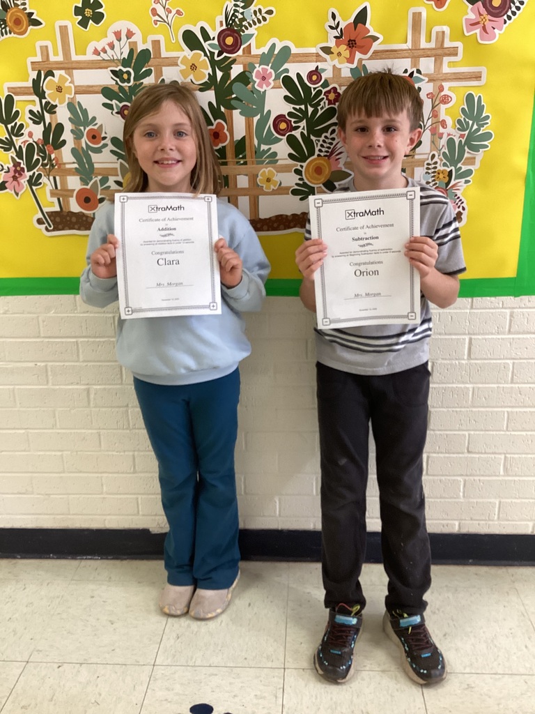 Students with certificates.