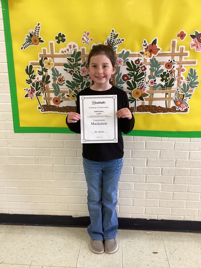 student with her certificate