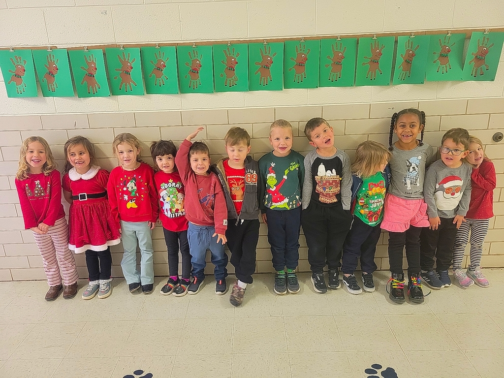 students in Christmas shirts.