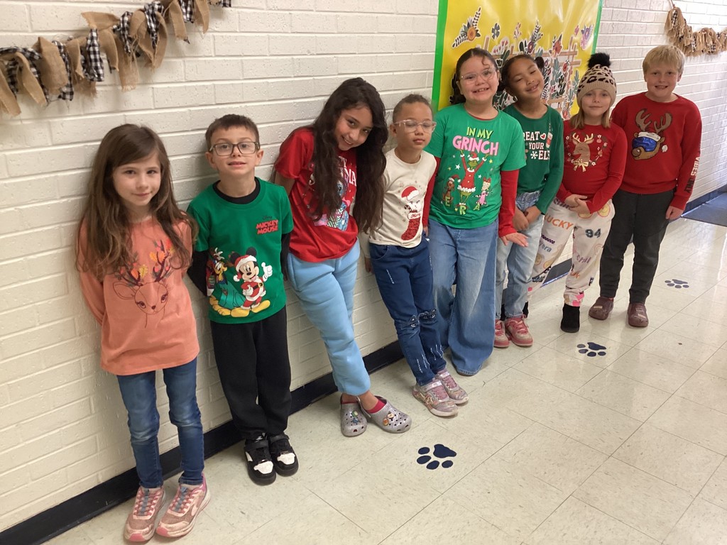 students in Christmas shirts.
