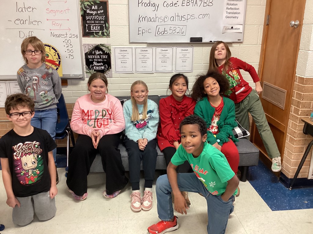 students in Christmas shirts.