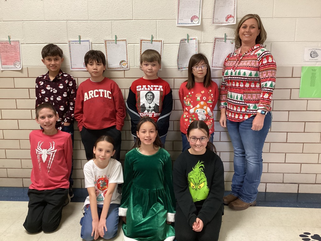 students in Christmas shirts.