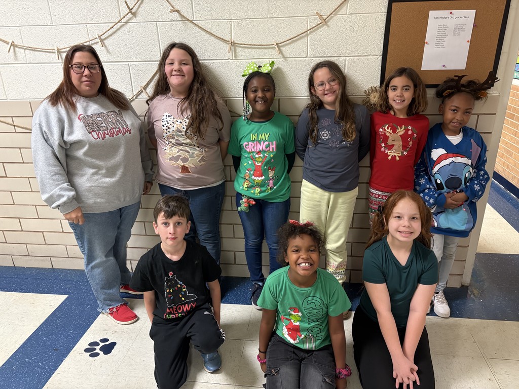 students in Christmas shirts.