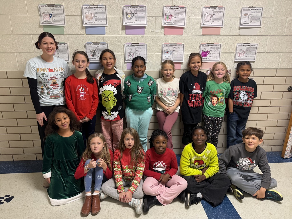 students in Christmas shirts.