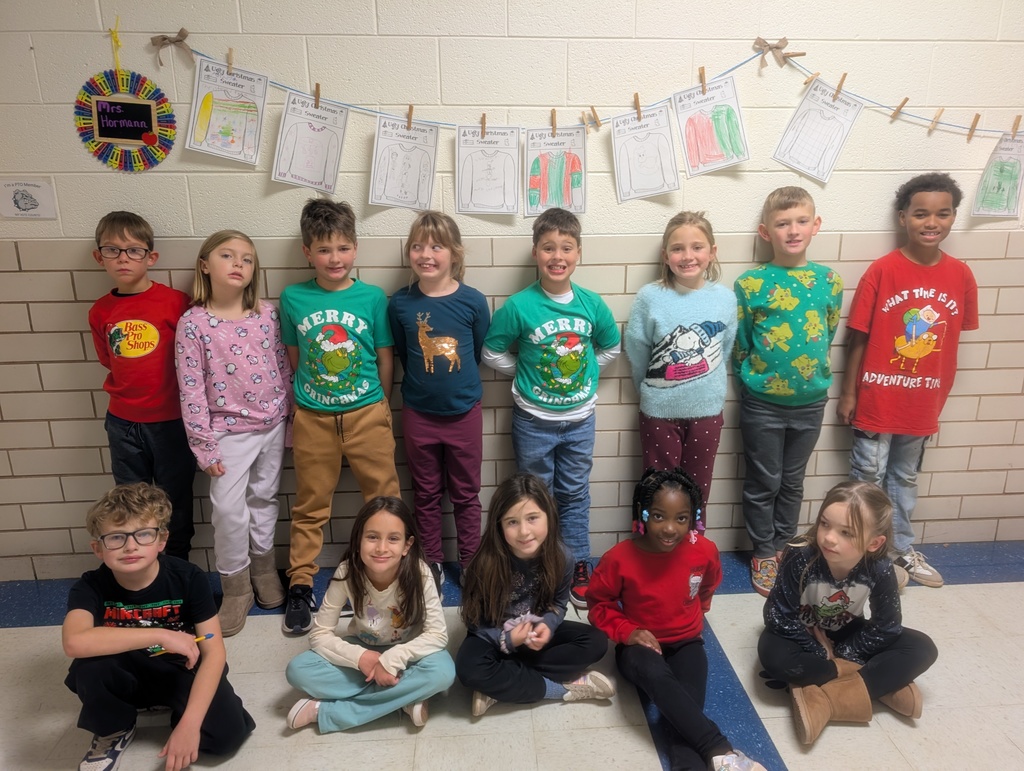 students in Christmas shirts.