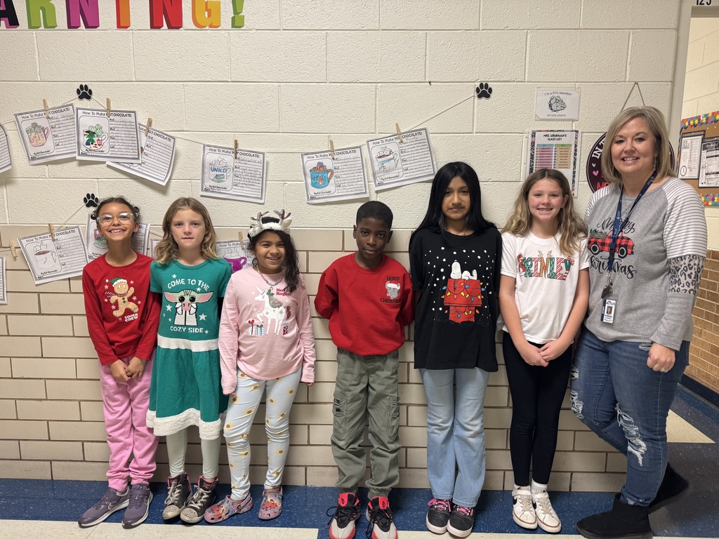 students in Christmas shirts.