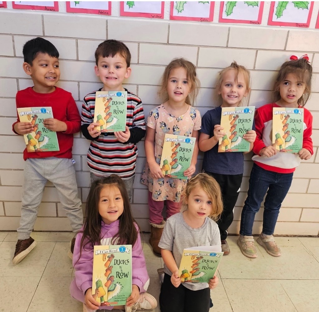 Students with their new books. 