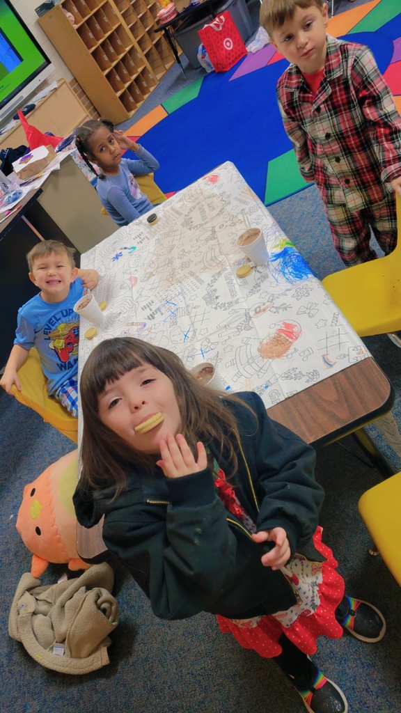 students eating cookies.