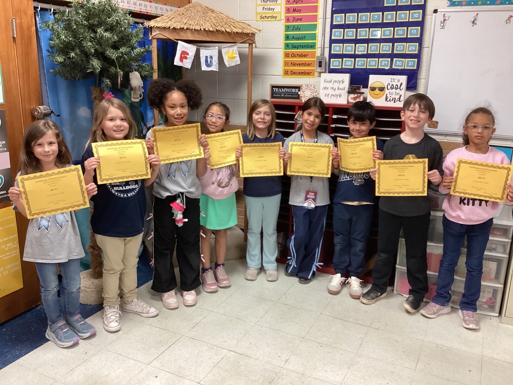 students with their certificates