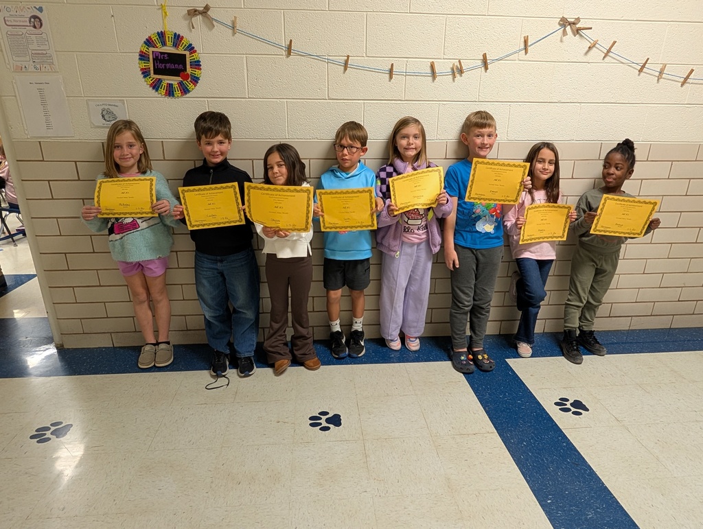 students with their certificates