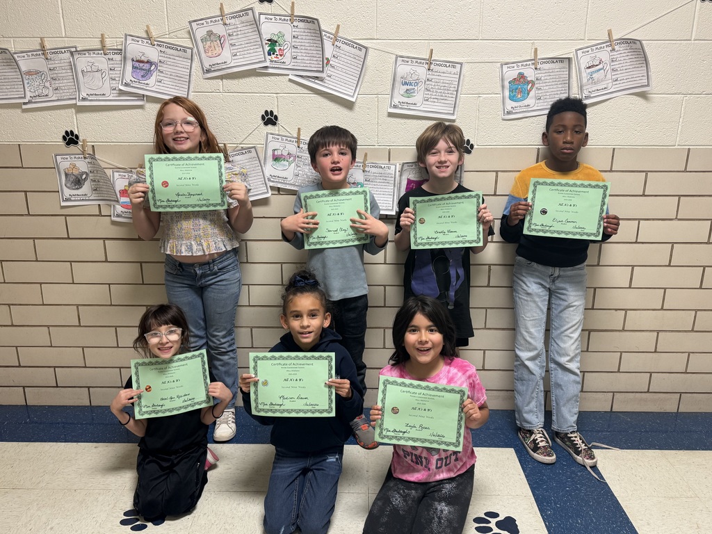 students with their certificates