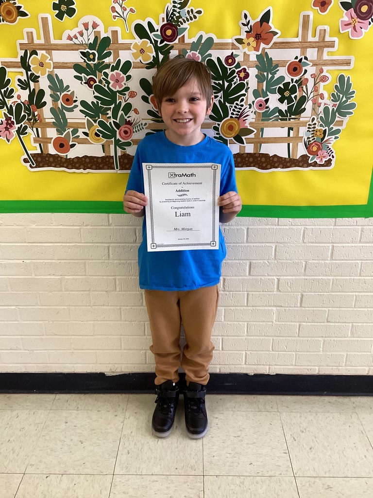 student with their certificate