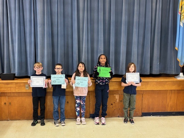 Students with their certificates.