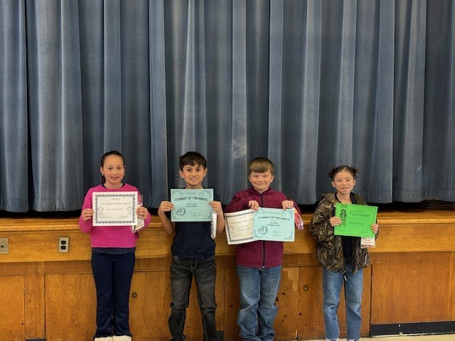 Students with their certificates.