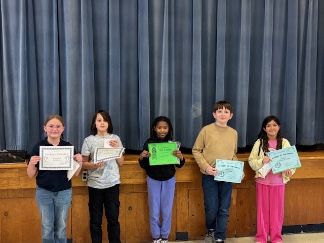 Students with their certificates.