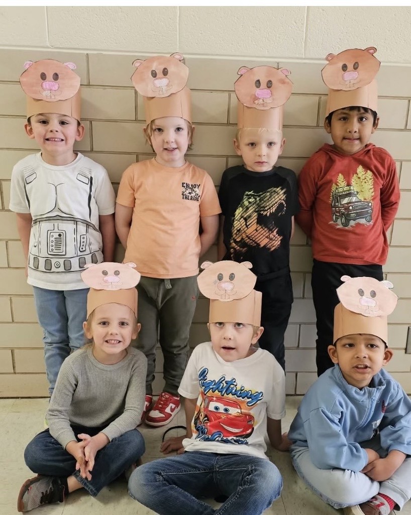 Students wearing hats.