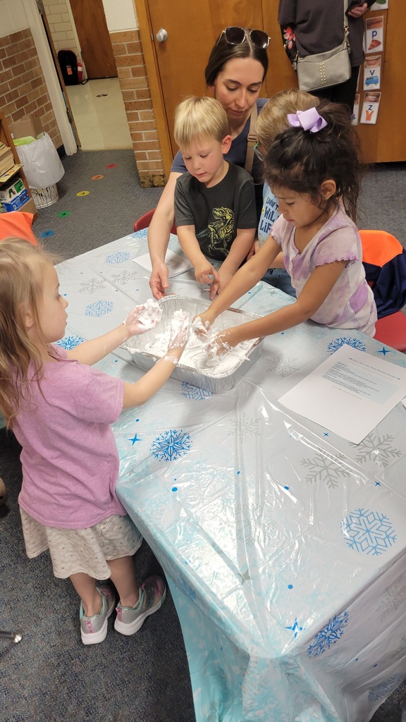 Students and parents doing STEAM.