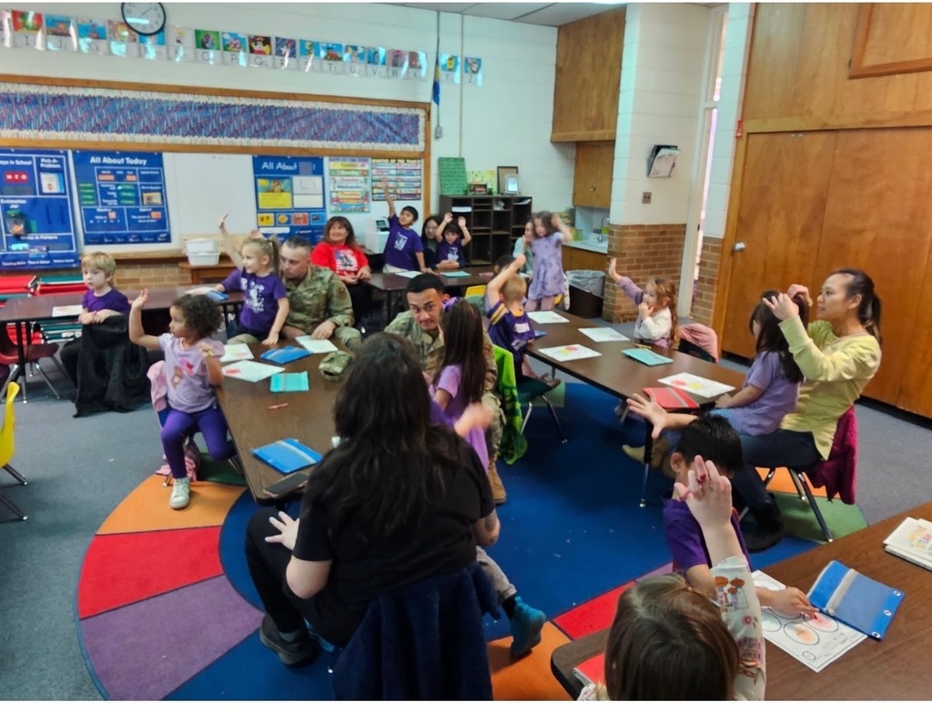 Students doing STEM with parents.
