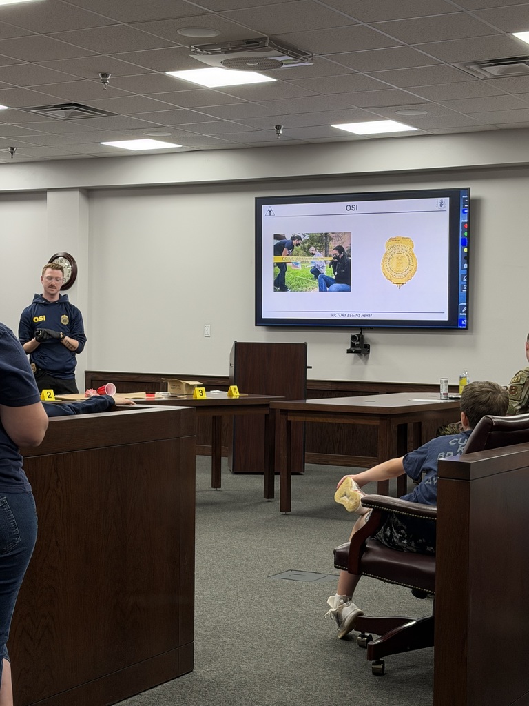 Students listening to a presentation.