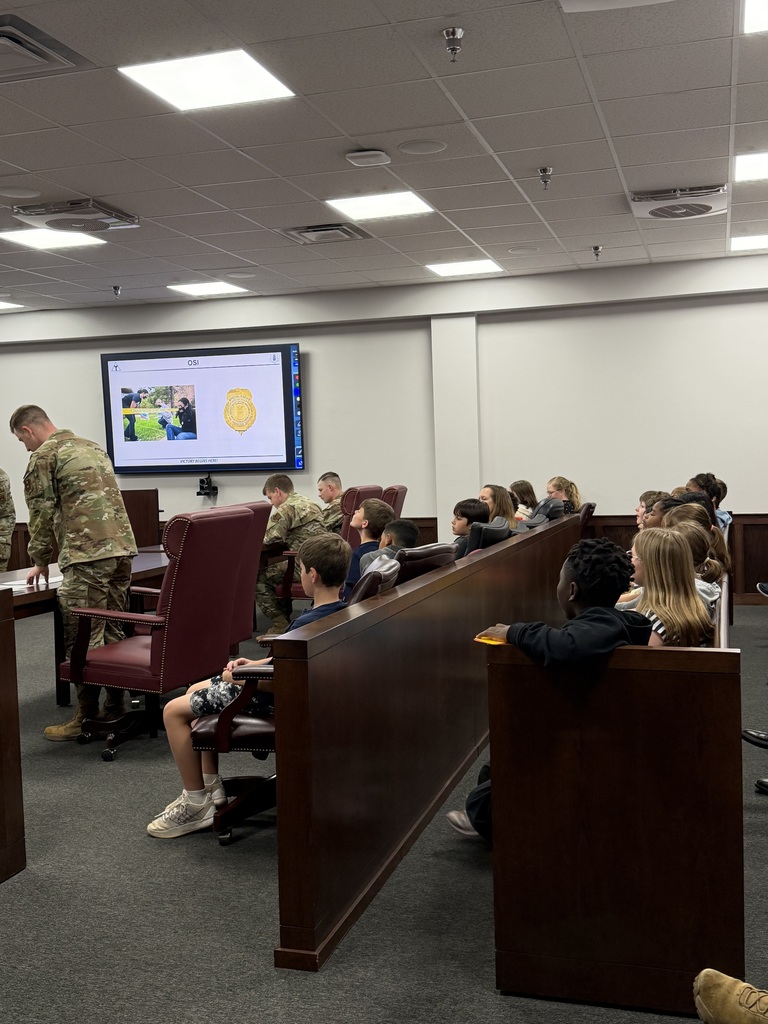 Students listening to a presentation.