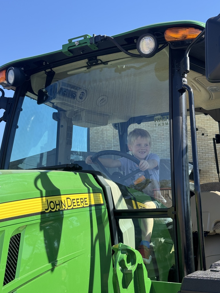 Driving Tractor
