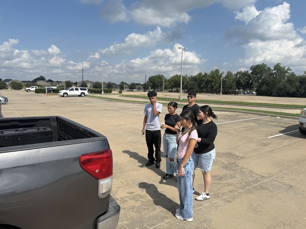 Students using two way radios