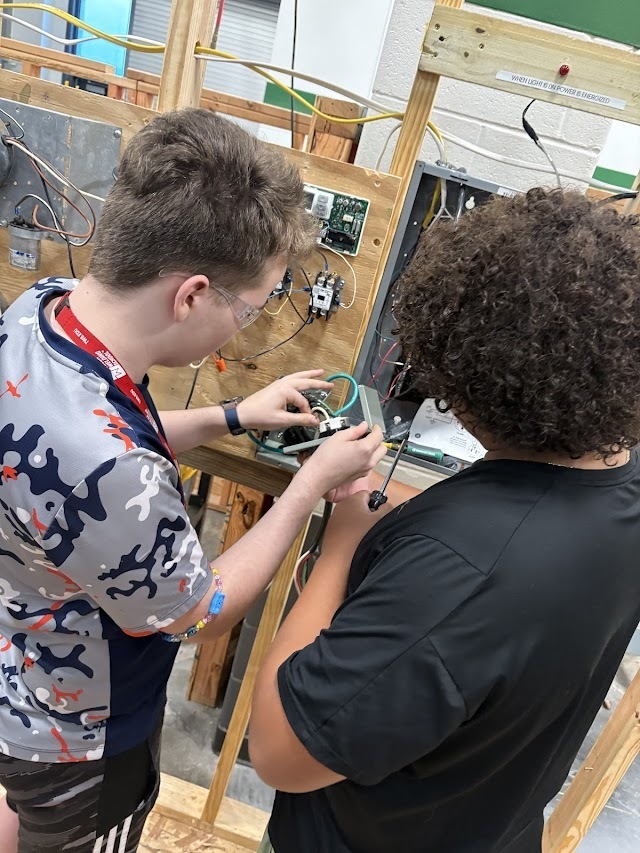 Students working on electrical