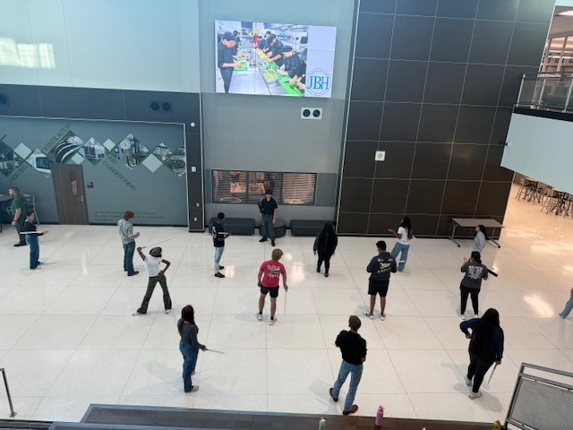 Students learning baton tactics
