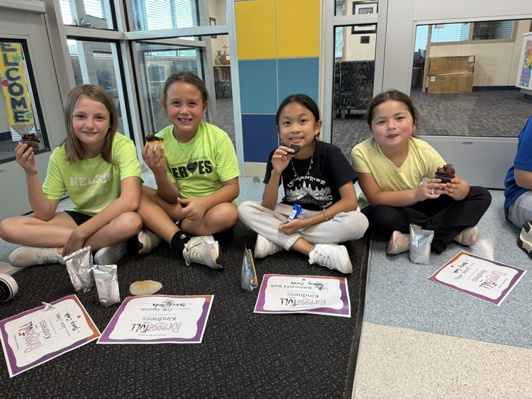students with cupcakes