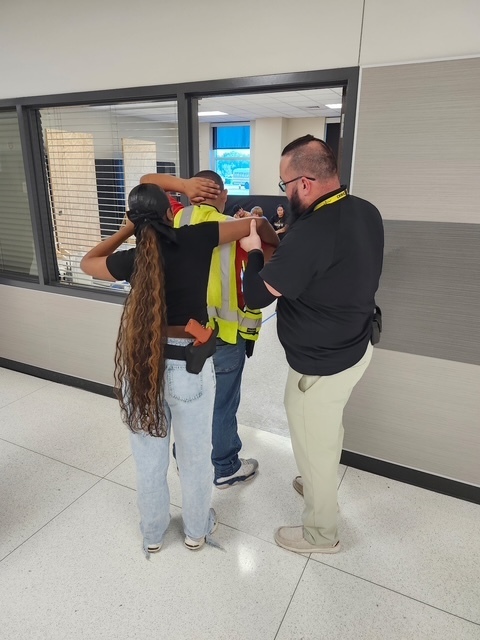 Law II students practicing building search