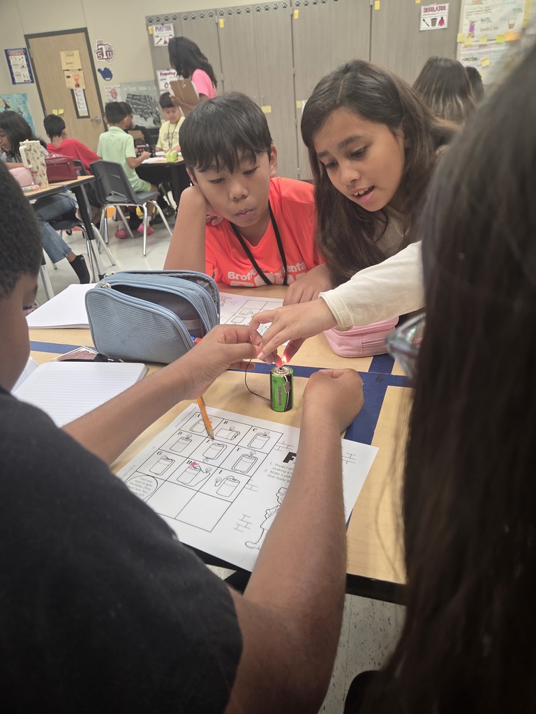Students working together to build a circuit