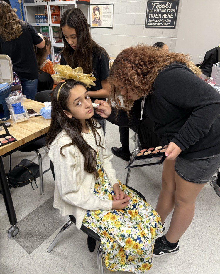 Lucy getting makeup .