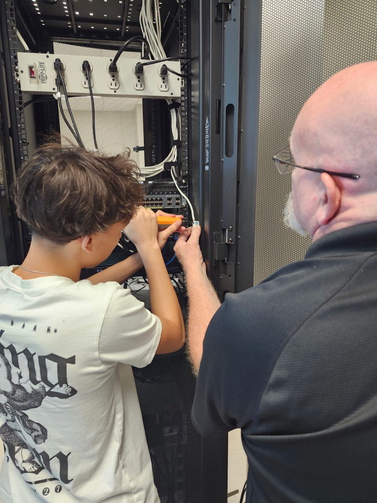 teacher and student working together