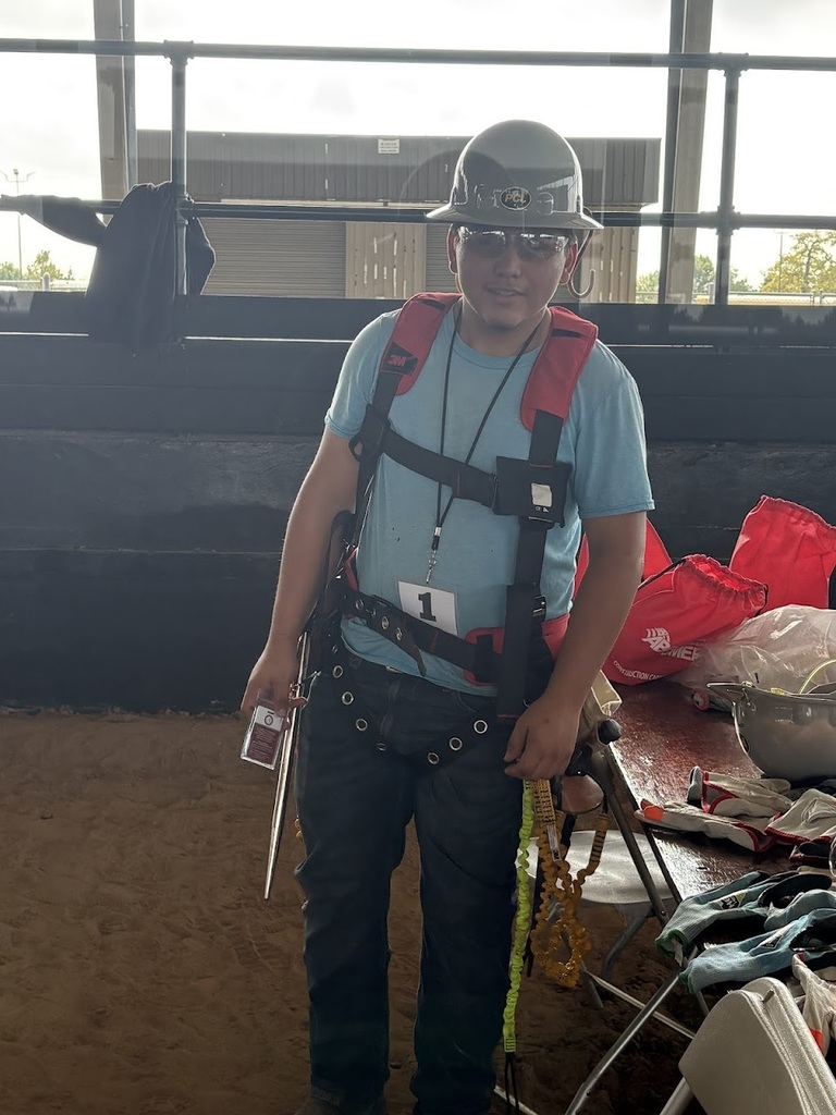Construction and welding students at construction fair.