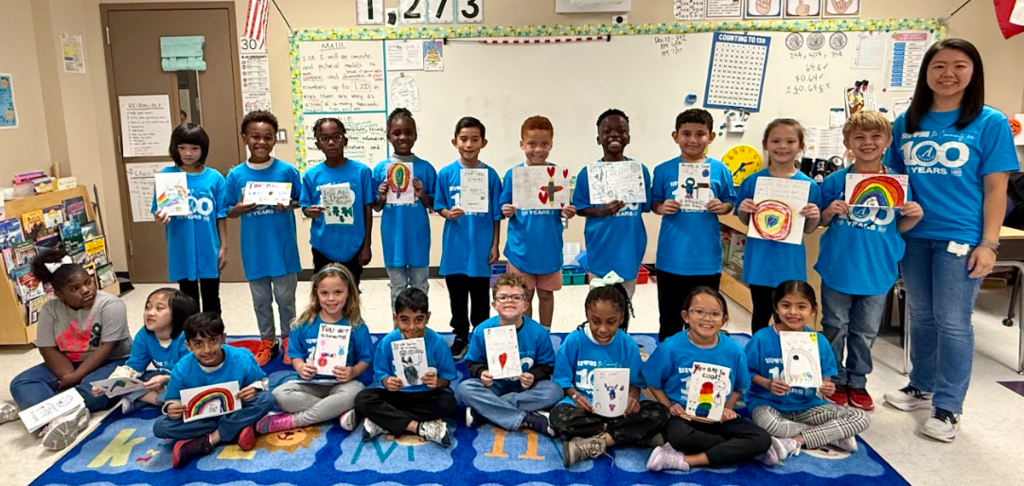 Second grade pictures of students working on their cards for children in the hospital