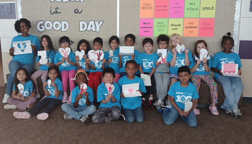 Second grade pictures of students working on their cards for children in the hospital